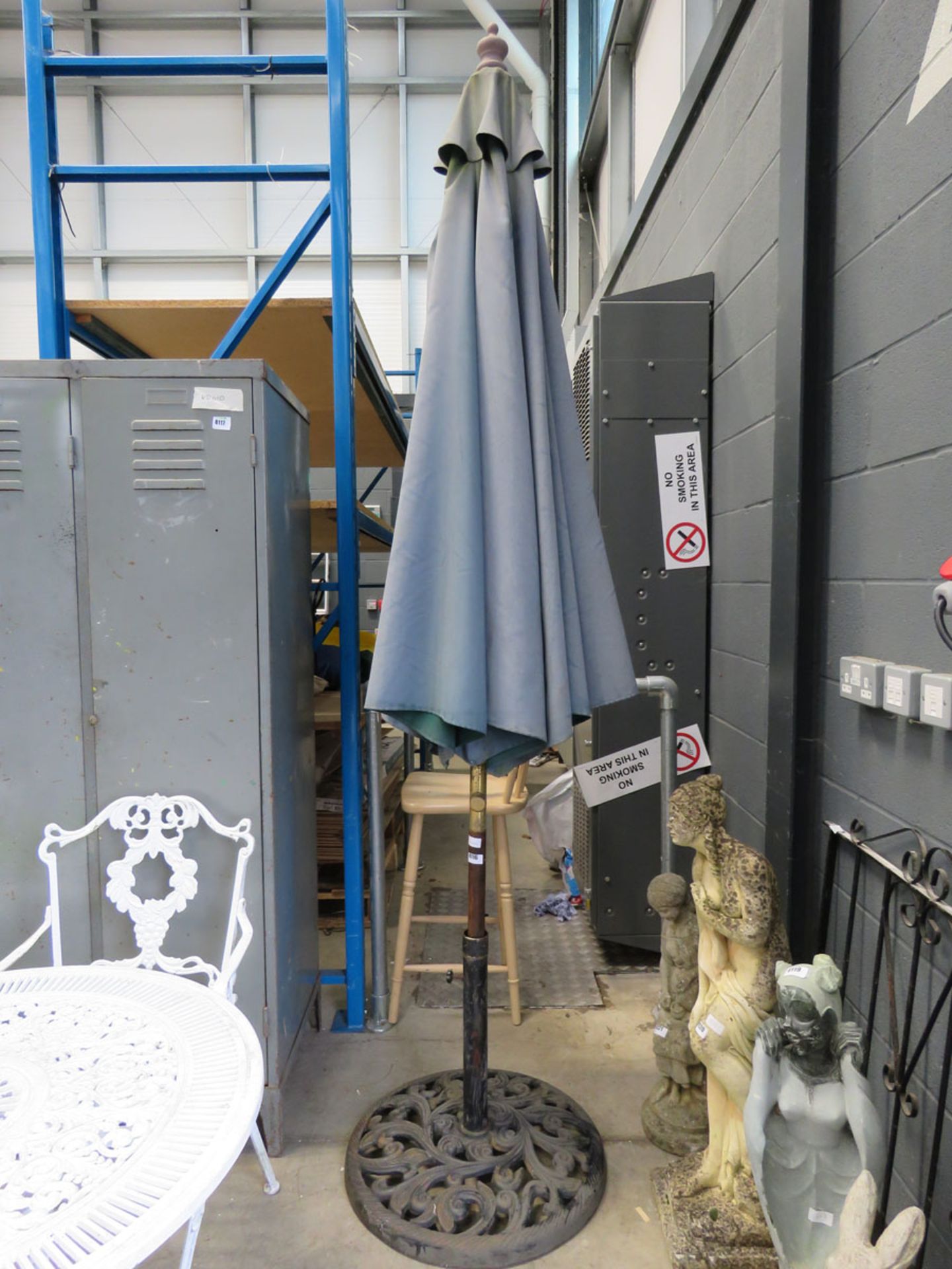 Large parasol and metal stand