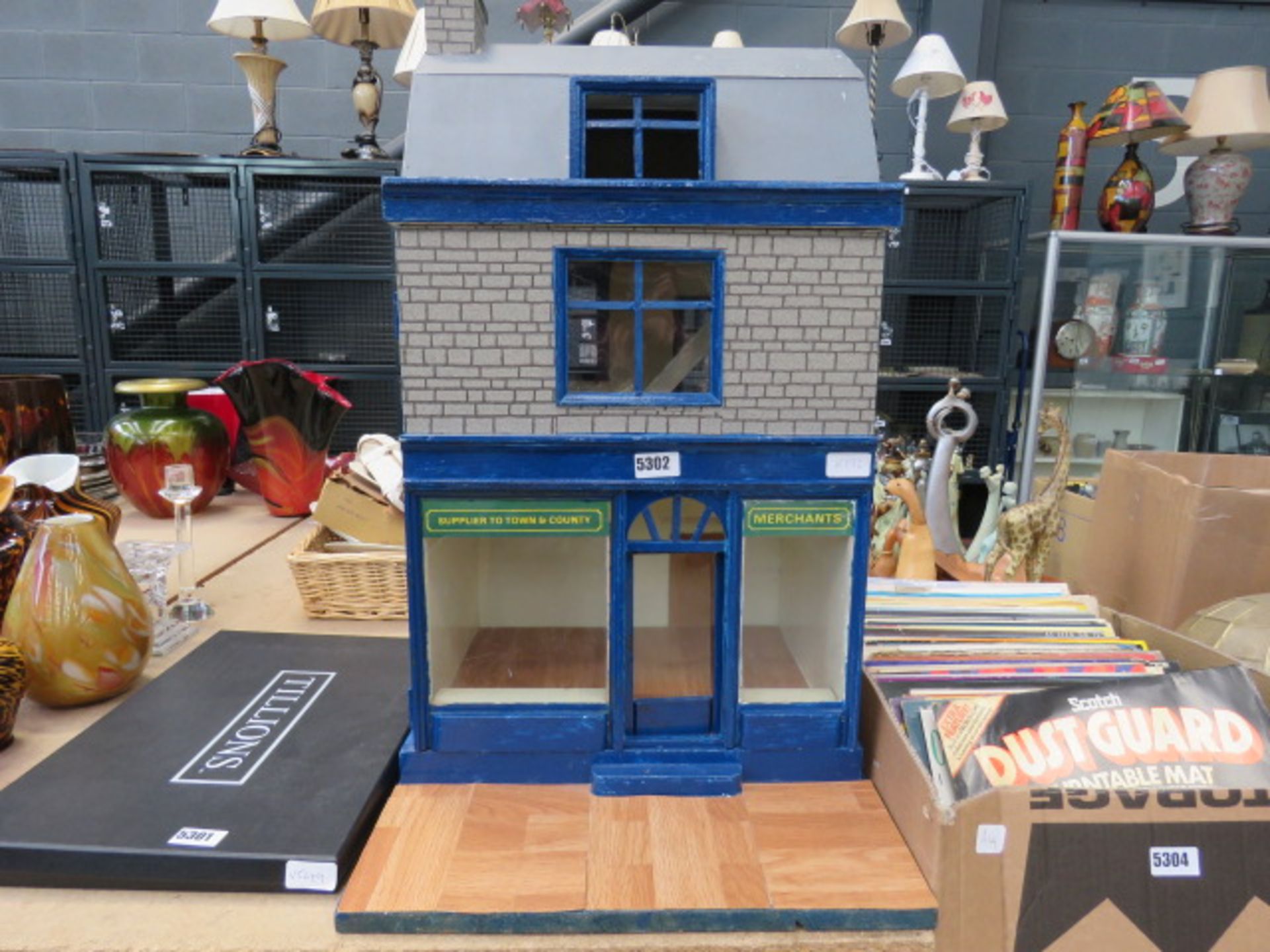 Dolls house in form of a shop