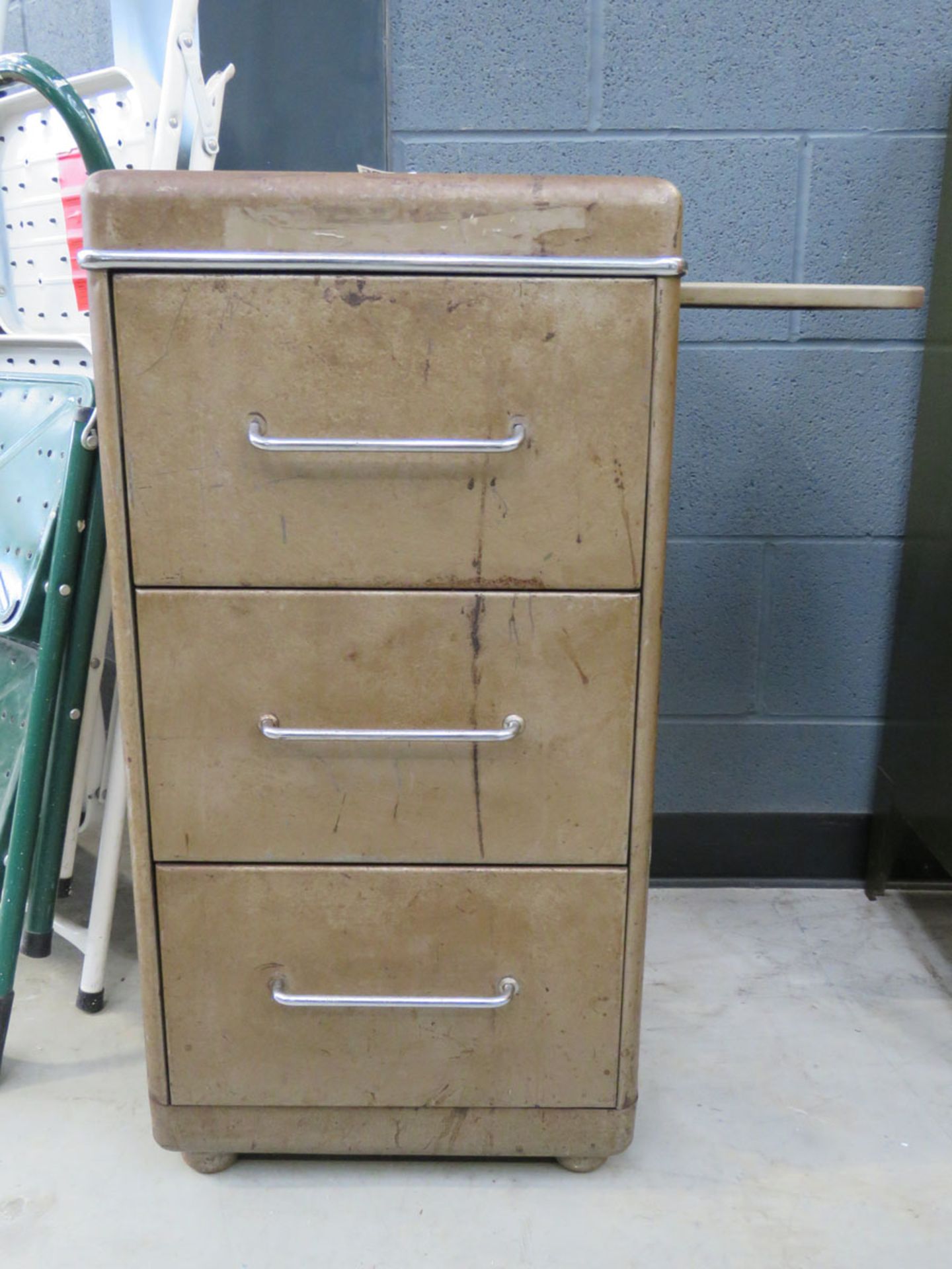 Metal 3 drawer filing cabinet with slide to side In sound condition, but with paint loss and