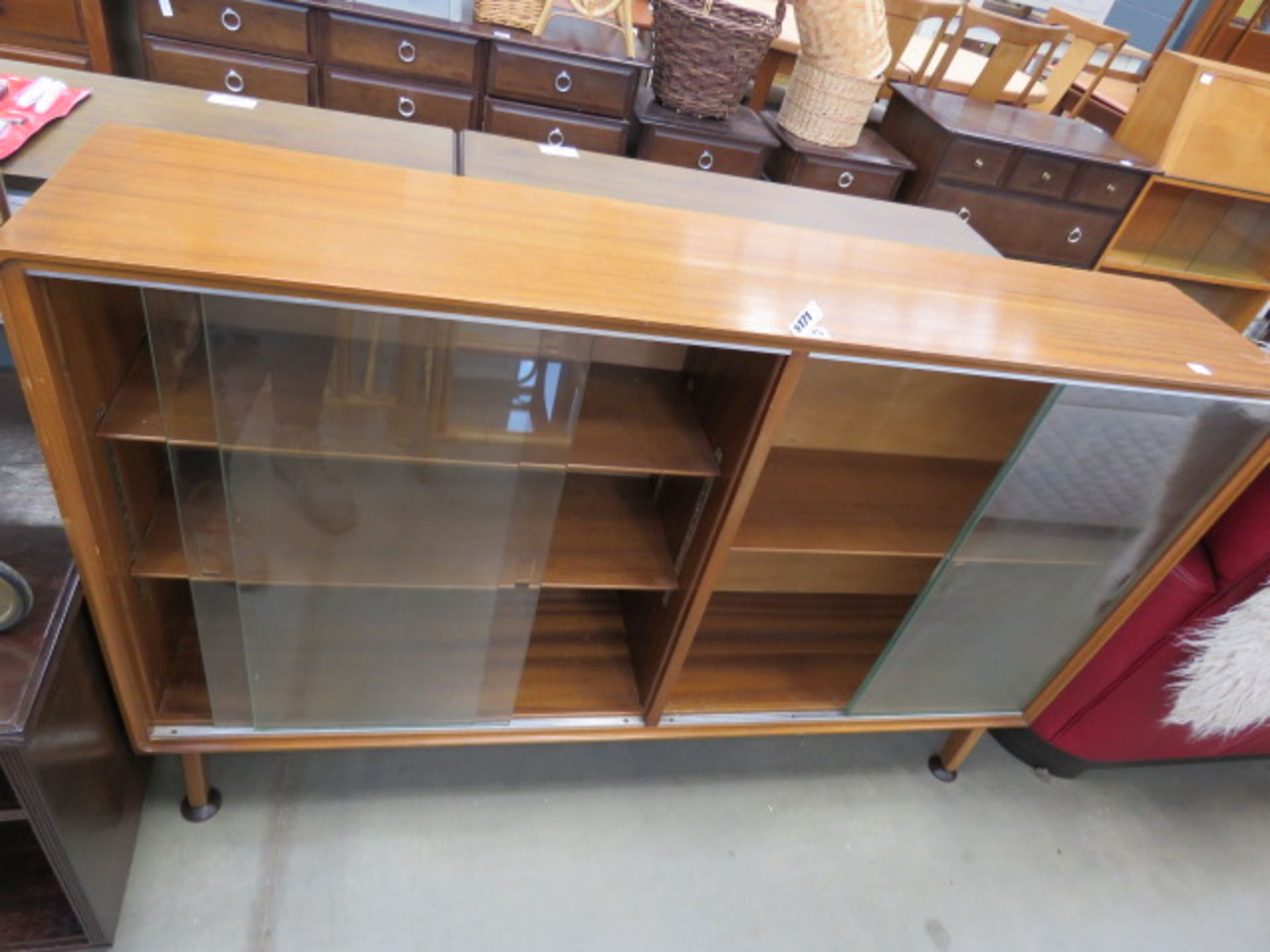 5225 - Teak bookcase with glazed sliding doors A few marks but in sound condition