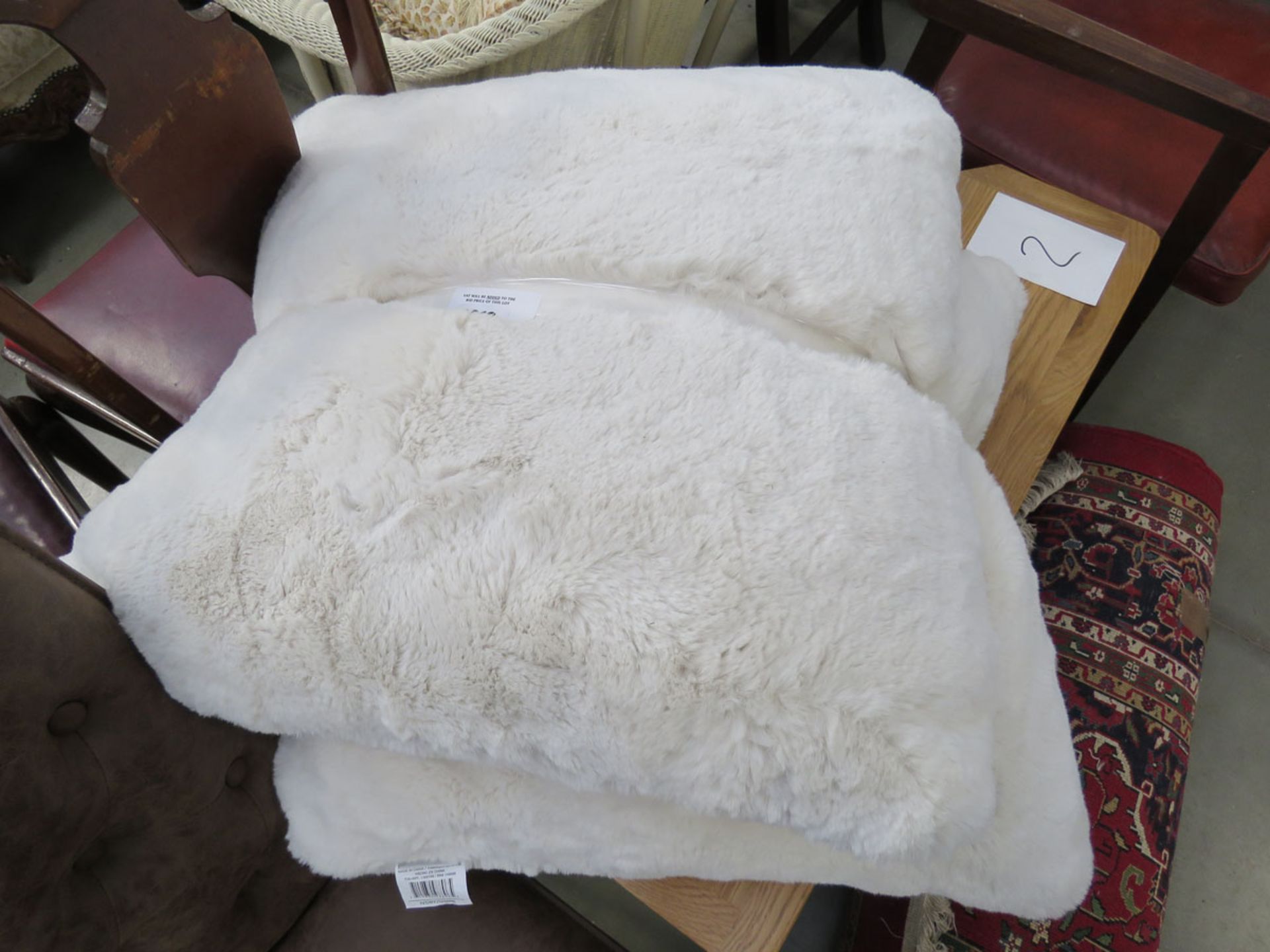 Pair of fluffy cream Mon Chateau Luxury cushions