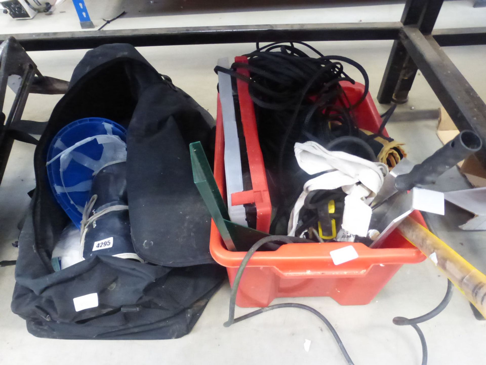 Bag and box containing hard hat, overalls, drill bits, paint roller, rope etc