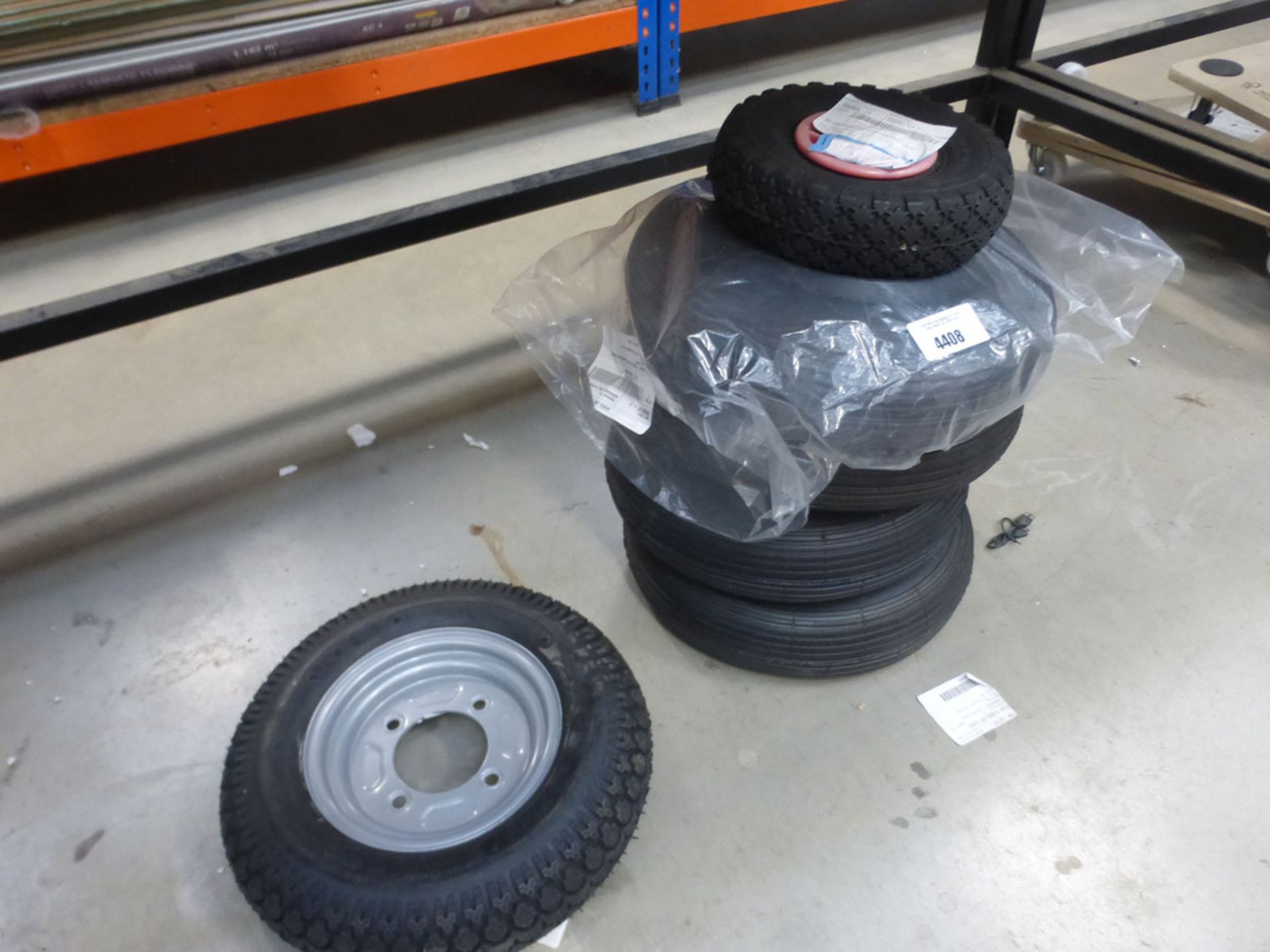 5 wheelbarrow wheels and small sackbarrow wheel