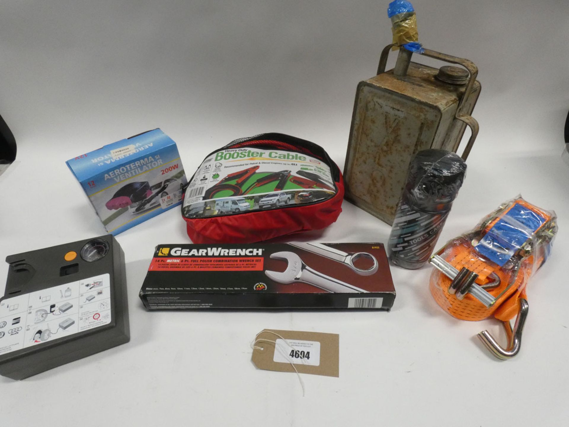 Bag containing: heavy duty booster cables, tyre pump, ratchet strap, vintage fuel can and