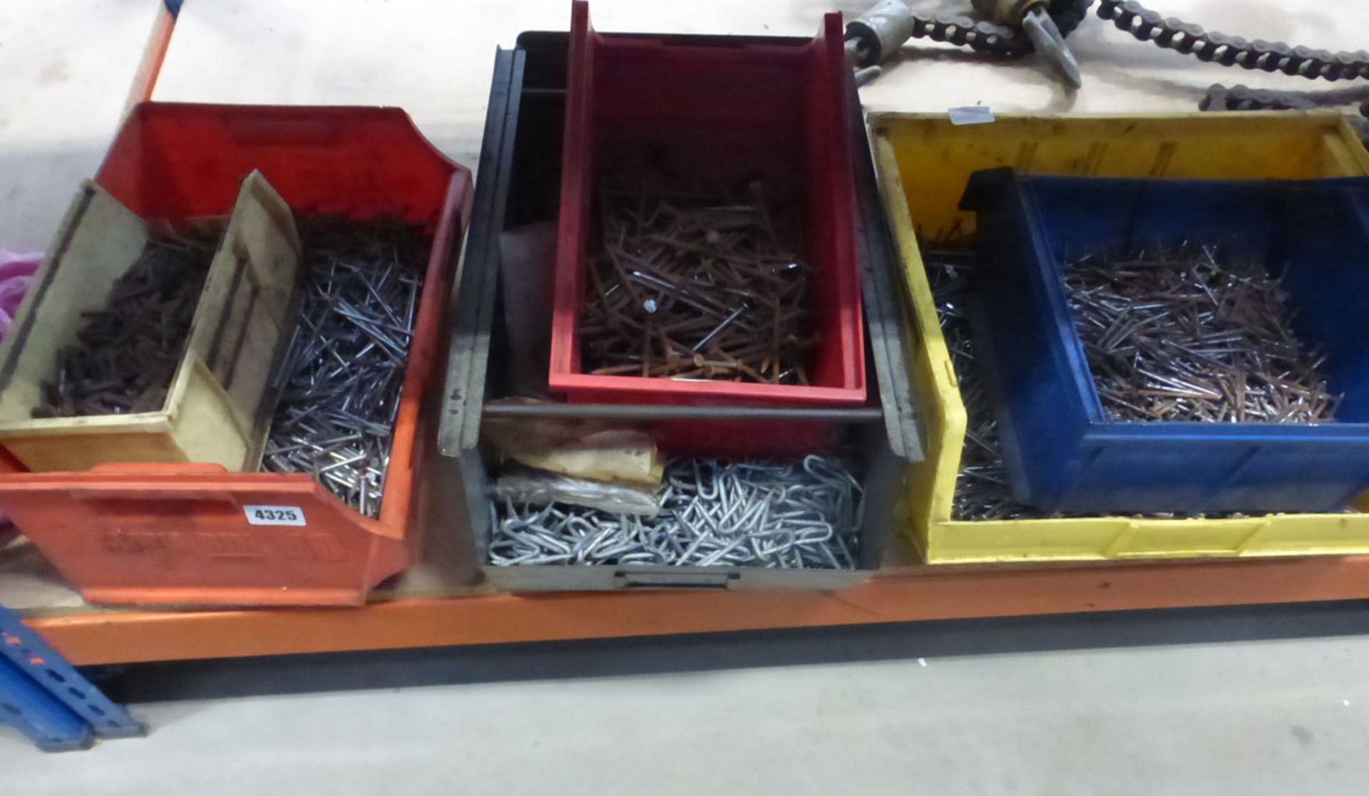 5 boxes containing nails and u-pins