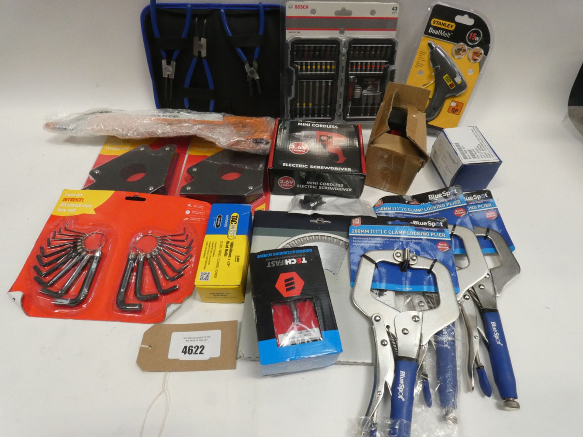 Bag containing Bosch screwdriver set, Stanley glue gun, Blue Spot clamp locking pliers, Amtech