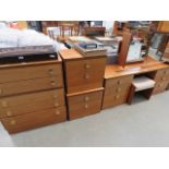 Teak part bedroom suite comprising dressing table and stool, chest of 5 drawers plus a pair of 2