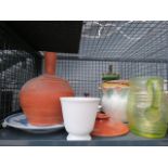 Cage containing table lamp with glass shade, terracotta pot, converted oil lamp, pots and jugs