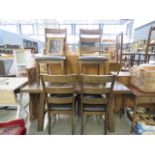 Dark wood extending dining table plus 6 chairs