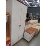 Cream painted pine bedroom suite comprising double wardrobe, chest of drawers plus a pair of 3