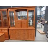 Oak finished glazed display cabinet with cupboard base under