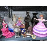 Cage containing various china and resin figures, Disney figures and brass candlestick