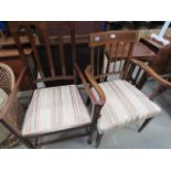 2 Edwardian mahogany armchairs with striped fabric seats