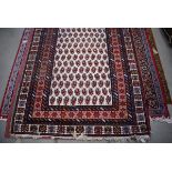 5011 Afghan woolen carpet with white ground and red border, approx. 1.9 x 2.5m