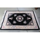 Black floral Chinese rug