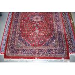 5014 Iranian carpet, red background and blue motifs, approx. 2 x 3m