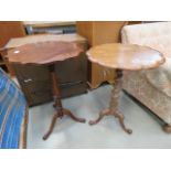 2 oak and mahogany tripod side tables Slight scratching to mahogany table and split at the bottom of