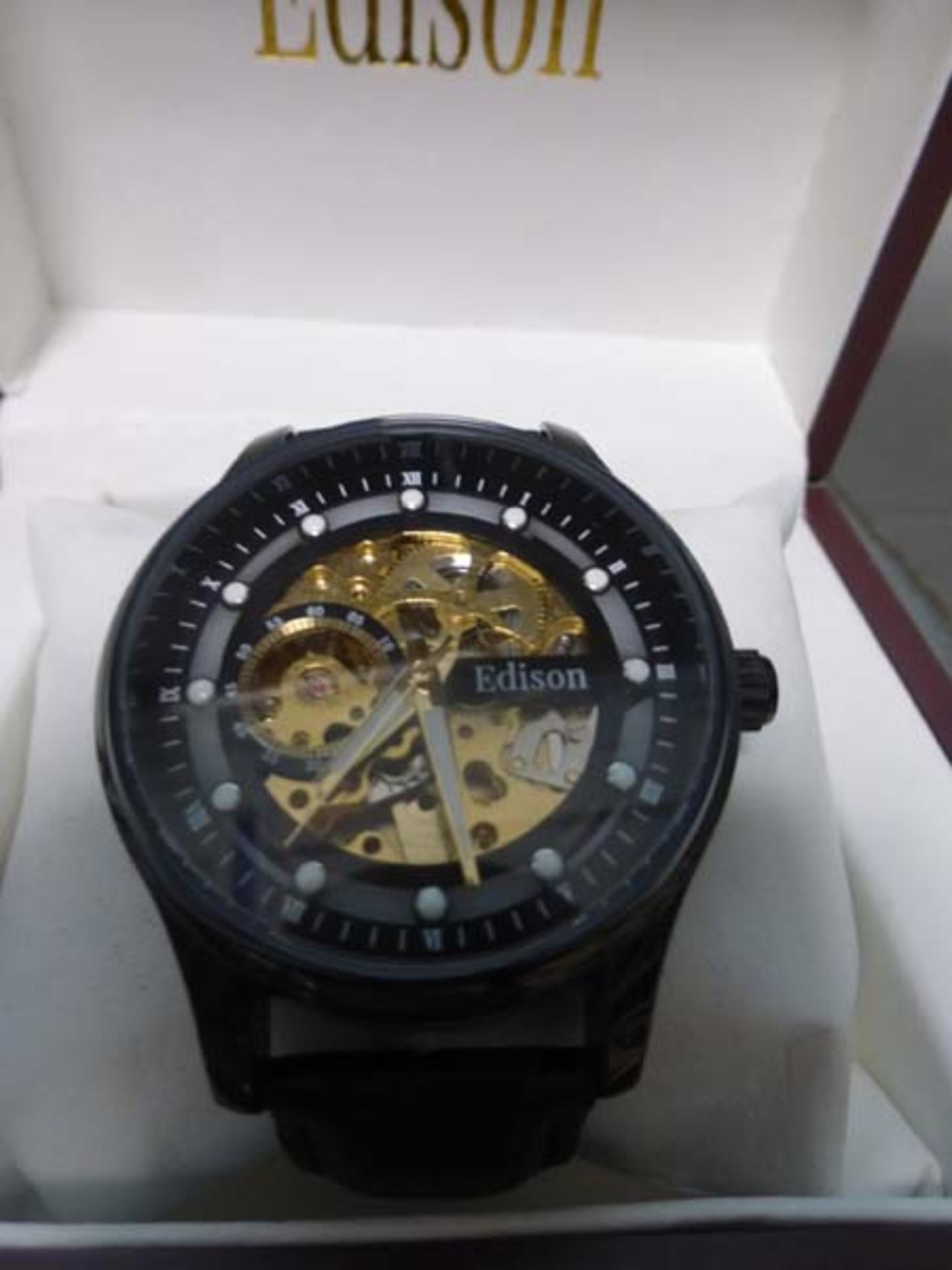 Gents open movement Edison automatic wristwatch with black leather strap in box