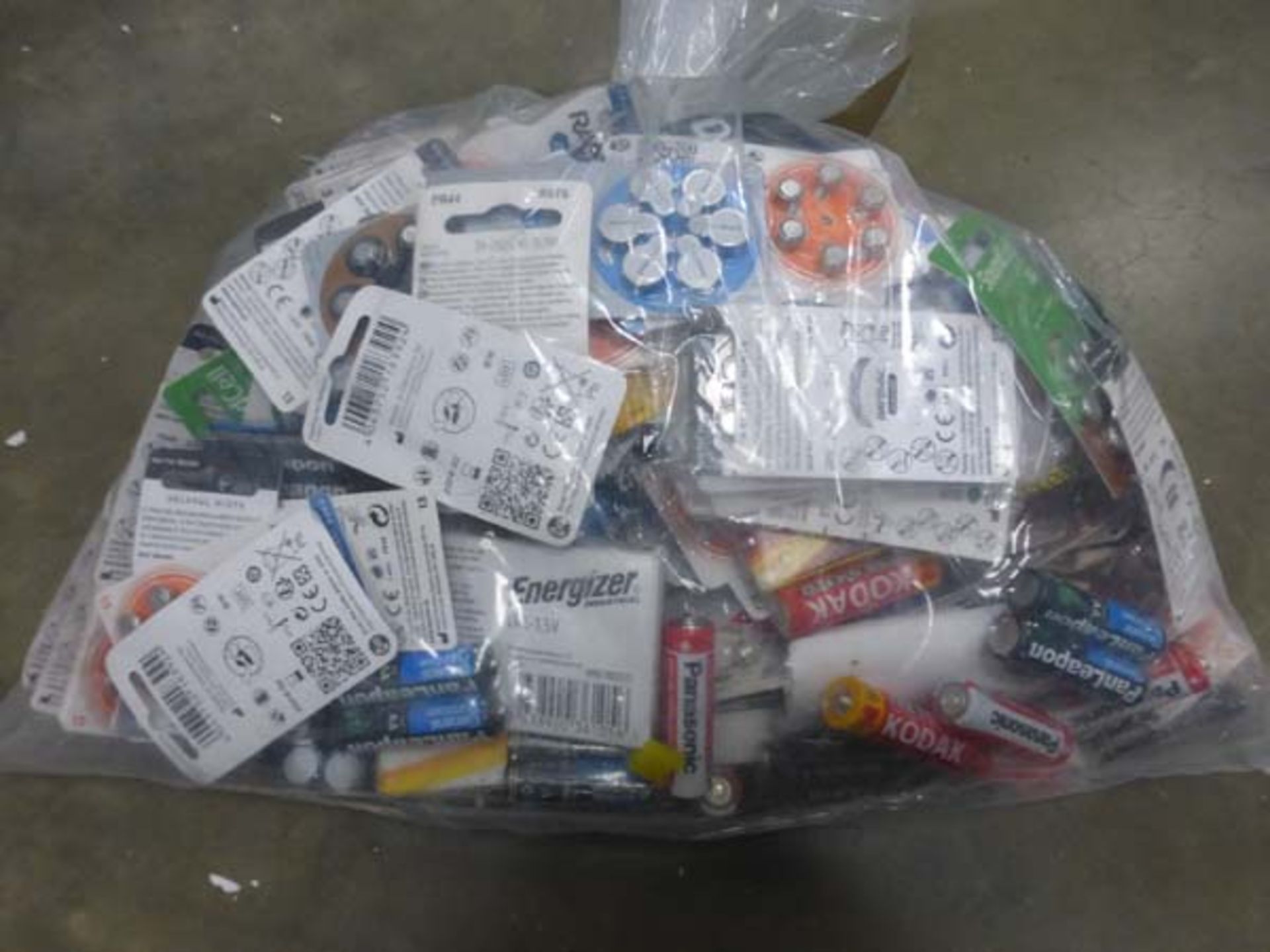 Bag containing various batteries by Energiser, Kodak, Panasonic inc. large variety of hearing aid