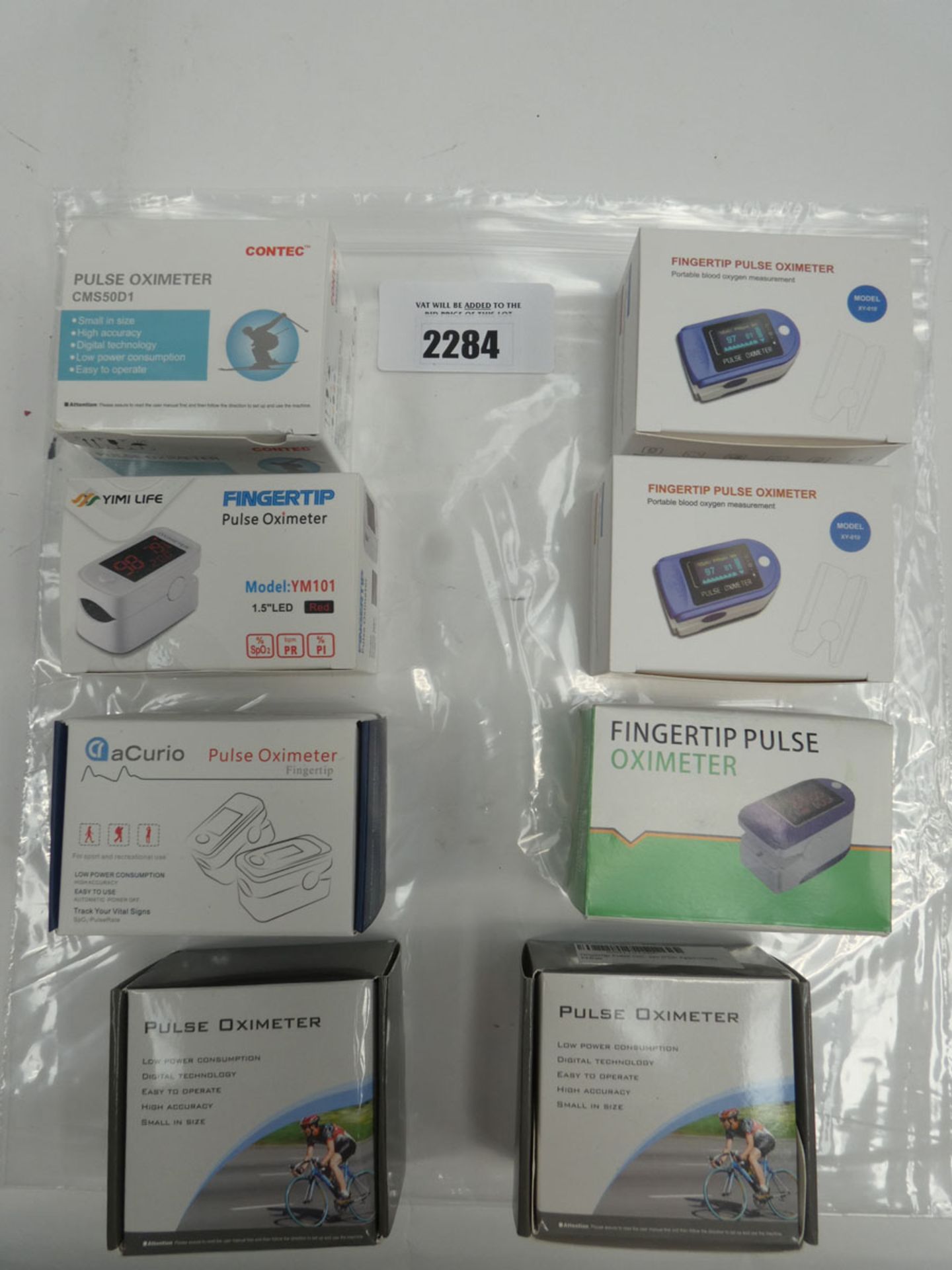 8x assorted fingertip oximeters