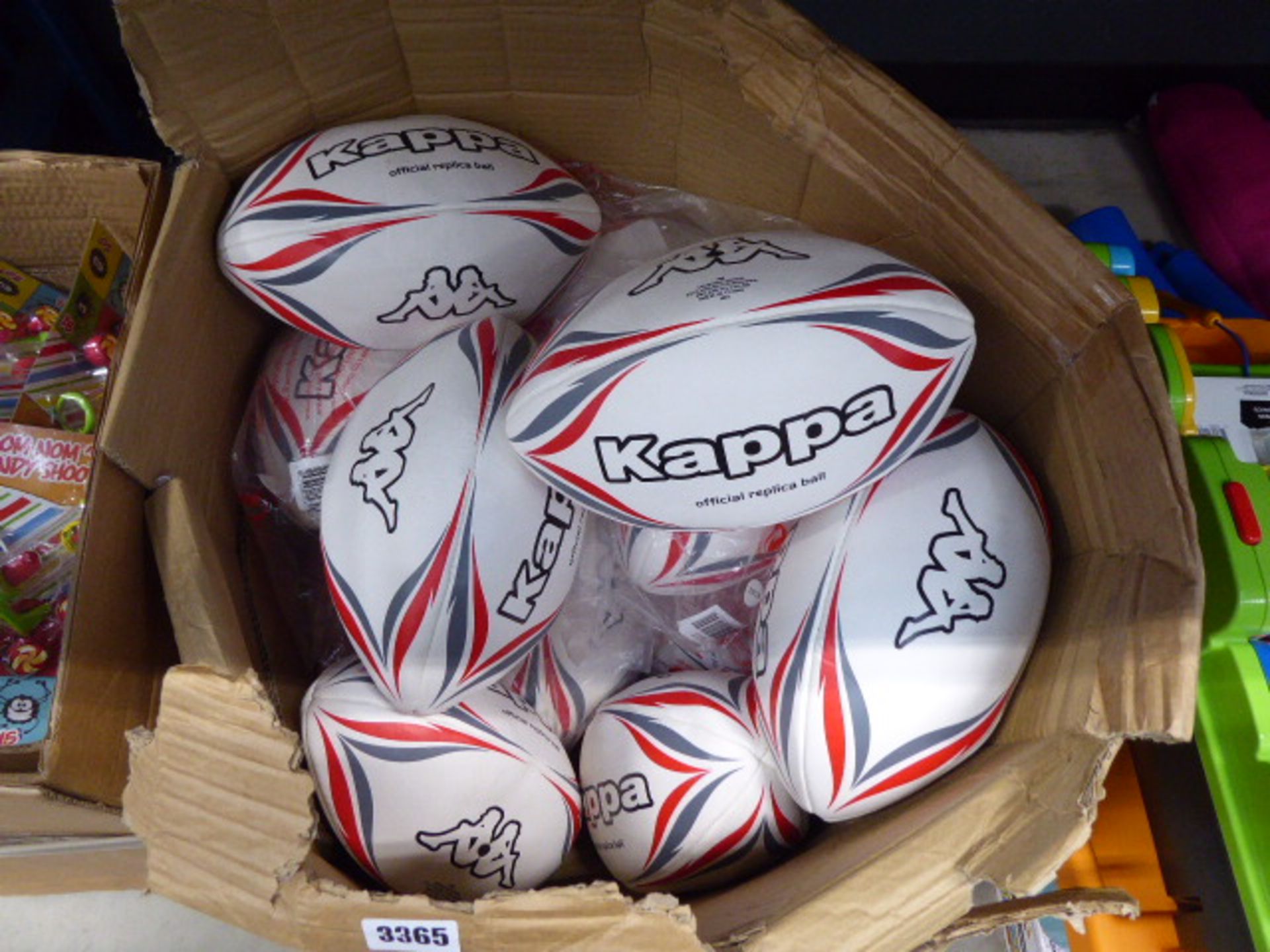 Box containing a qty of Kappa replica rugby balls
