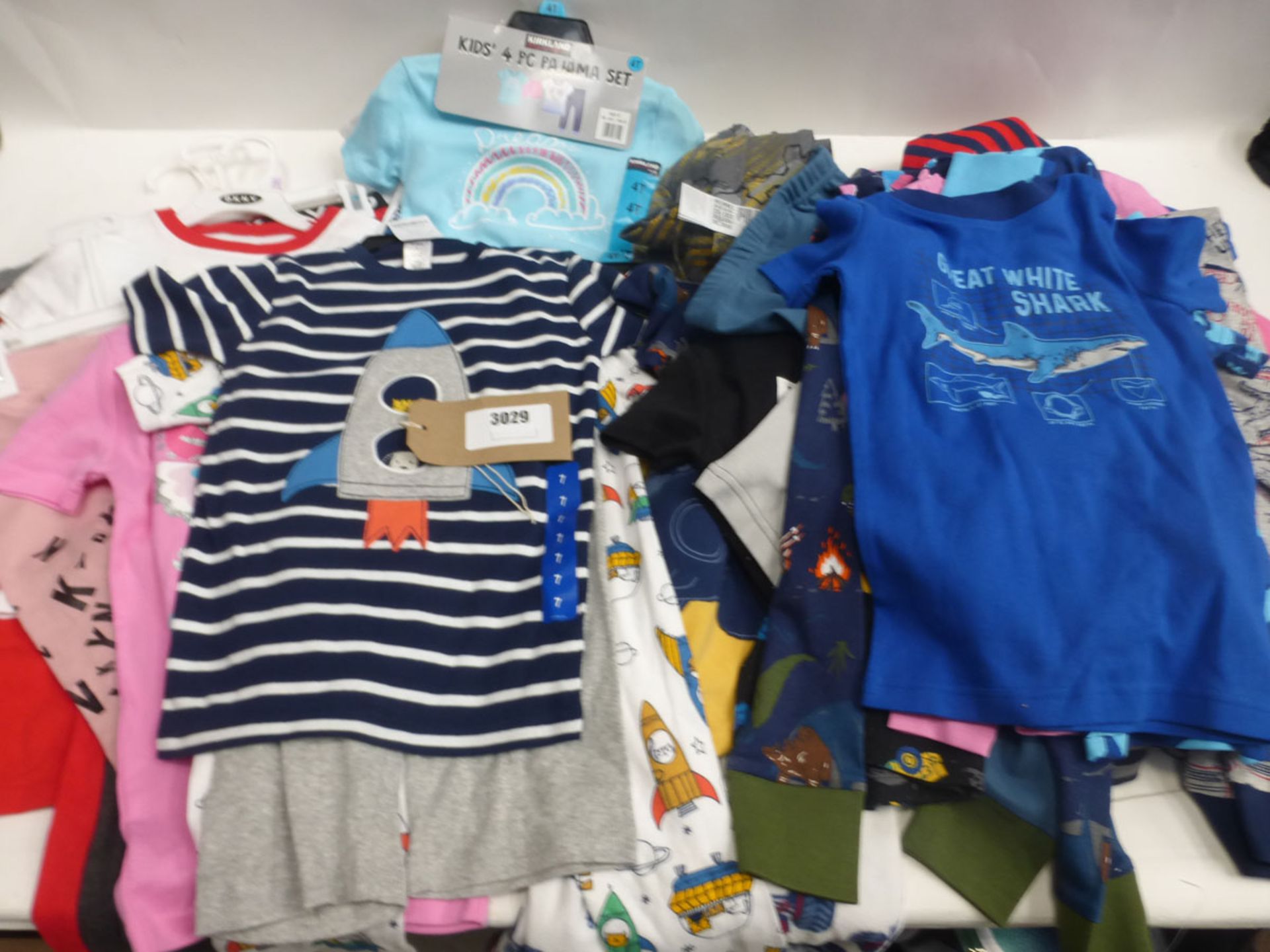 Large mixture of childrens clothing including Kirkland, Puma, DKNY etc