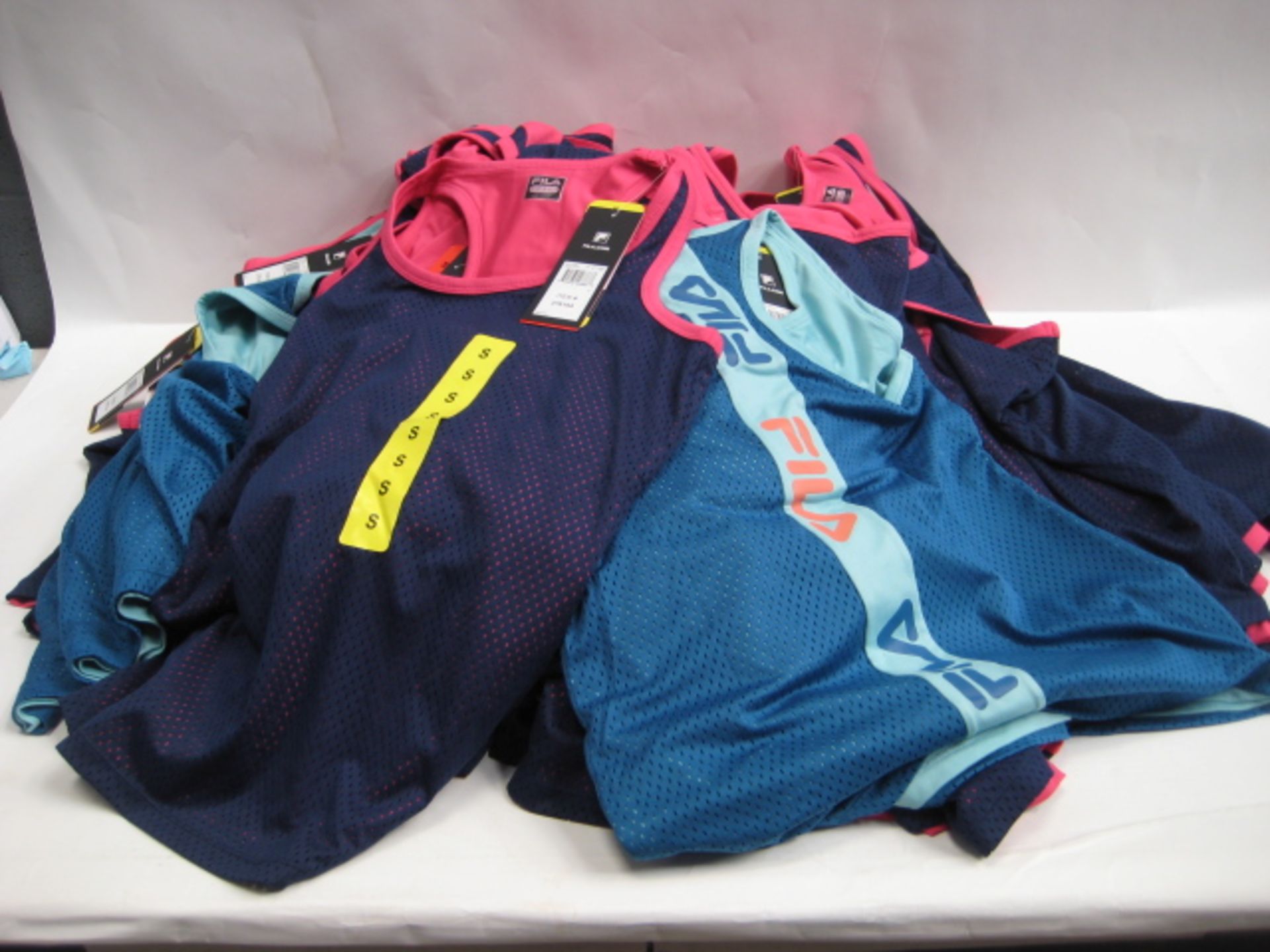 Bag containing 40 Fila ladies mesh overlay tank tops in pink and blue, light blue and turquoise,