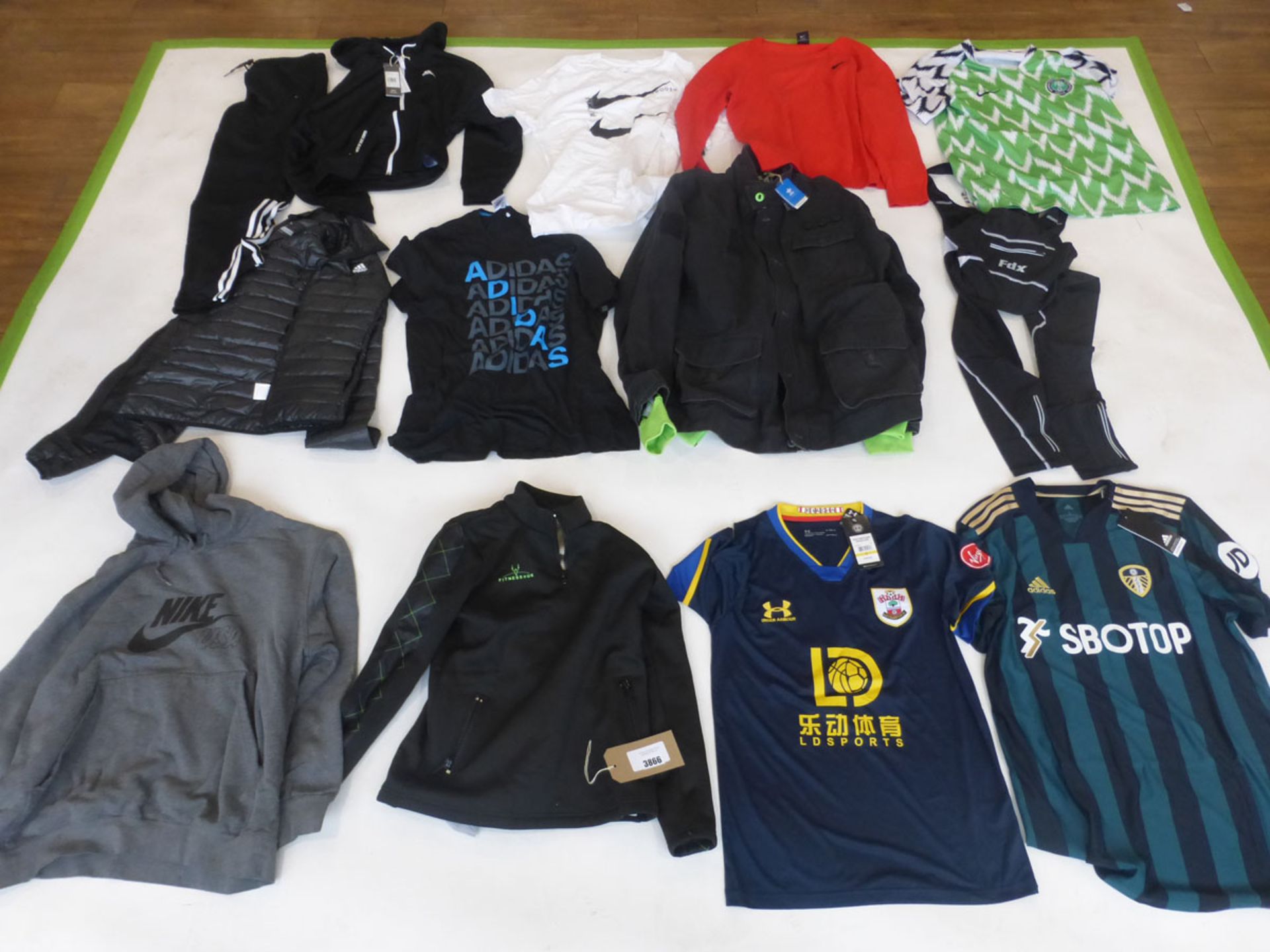 Selection of sportswear to include Adidas, Under Armour, Nike, etc