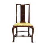A Queen Anne walnut side chair with a rectangular crossbanded and oyster veneered back,