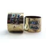 A pair of Edwardian silver napkin rings,