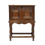 A 17th century and later oak bible box on stand,