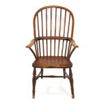 A late 19th/early 20th century elm seated hoop and stick back dining chair CONDITION