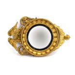 A gilt gesso wall mirror in the Regency manner,