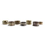 Seven early 20th century and later silver napkin rings, various designs, dates and makers,