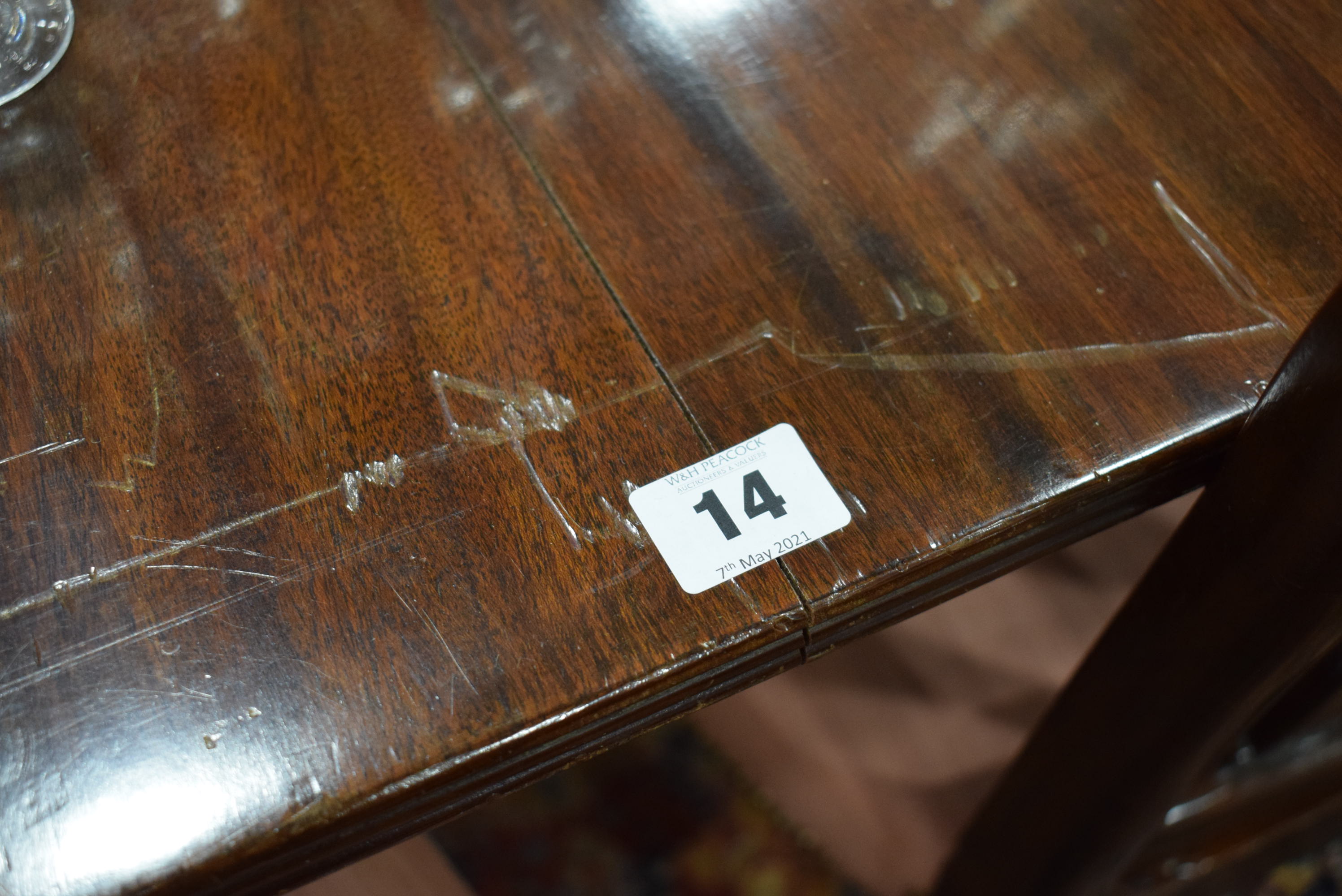 An early 20th century mahogany oval dining table on three columnar pedestals with reeded legs and - Image 7 of 12