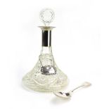 A moulded glass ships decanter with silver plated mounts, h.