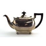 An early 20th century silver teapot of boat shaped form, Barker Brothers, Chester 1917, h.
