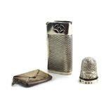 A late Victorian silver thimble of typical form, size 8, maker RP, Chester 1897,