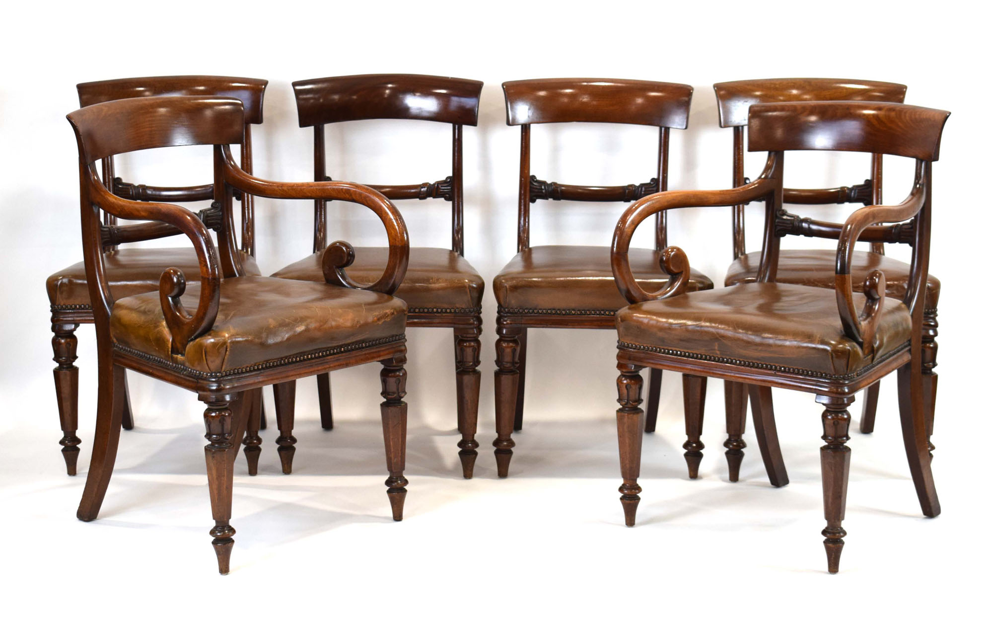 A set of six William IV mahogany bar-back dining chairs, including two carvers,