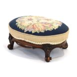 A 19th century embroidered stool with a carved walnut frame and cabriole feet CONDITION