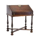 A William & Mary and later oak writing desk on stand,