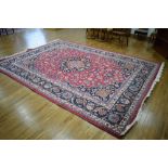 A 20th century Iranian multi-coloured carpet,