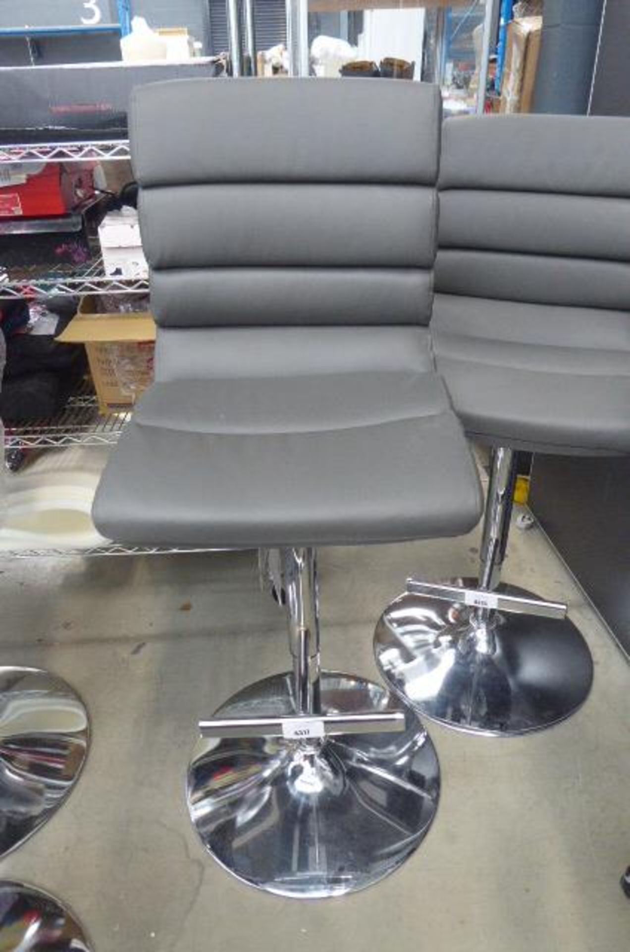 Grey chrome based bar stool
