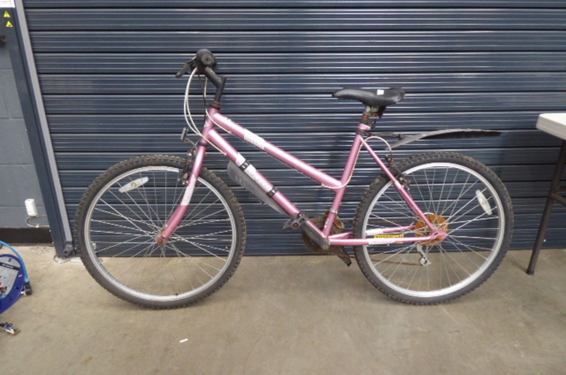 Pink ladies mountain bike Height: 30inch. Frame size 30 inches.