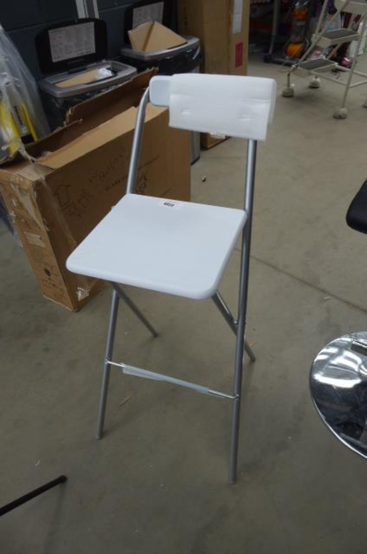 White fold up stool