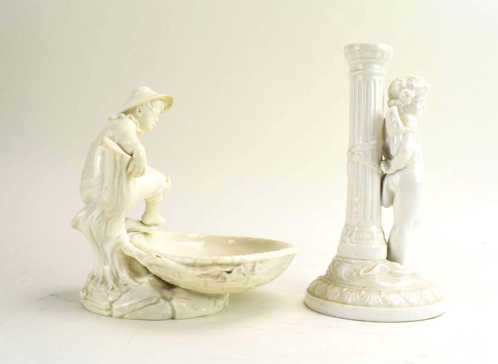 RR370 - A Royal Worcester blanc de chine dish modelled as a young boy sitting on a trunk, h. 15.5 cm - Image 3 of 7