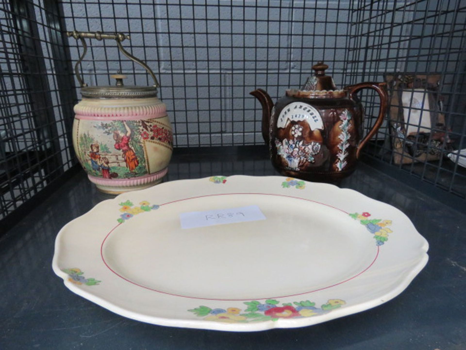 Cage containing a bargeware teapot, biscuit barrel, plus a Royal Doulton Minden floral patterned