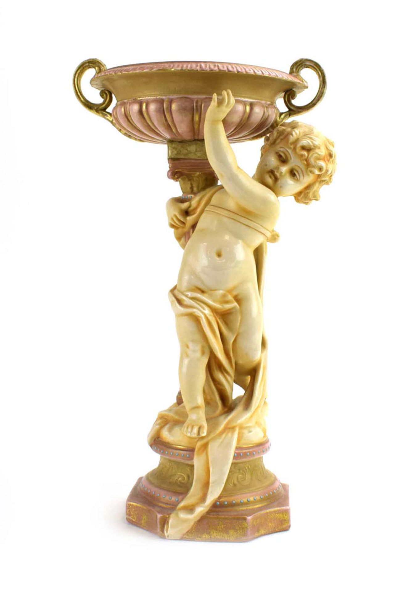 RR 368 - An ivory blush stand with urn shaped dish supported by a putti base gilt and jewel