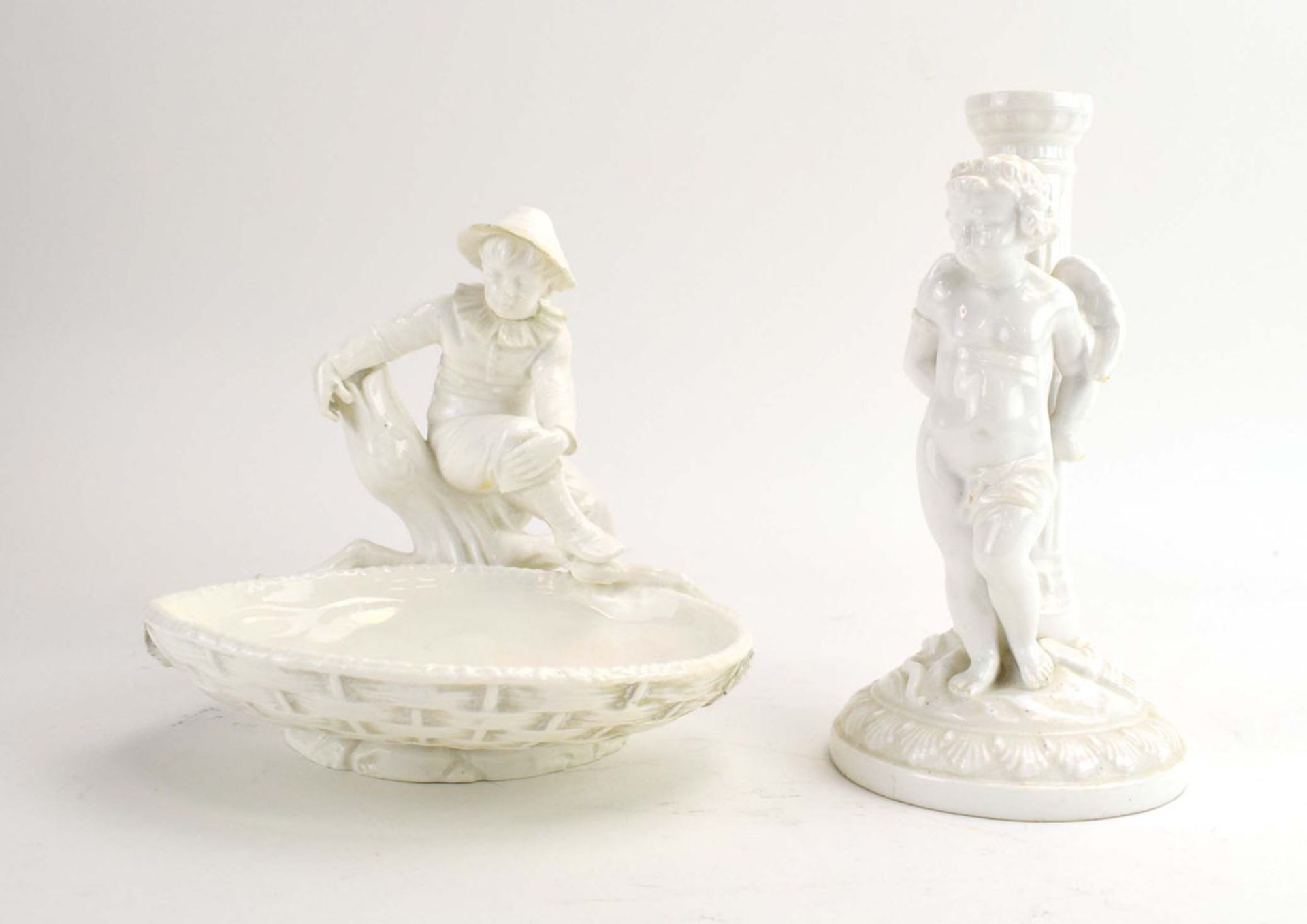 RR370 - A Royal Worcester blanc de chine dish modelled as a young boy sitting on a trunk, h. 15.5 cm - Image 2 of 7