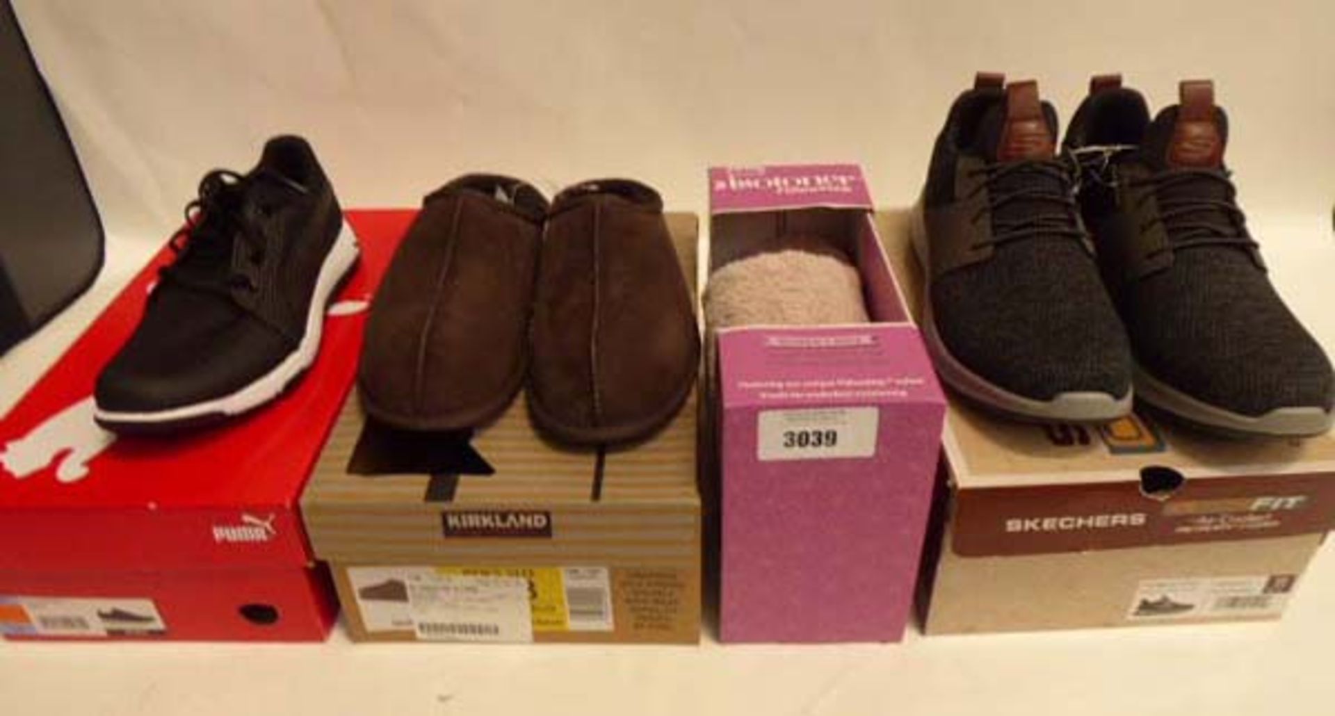 Boxed pair of Puma Grip Sport trainers (size 8.5), pair of Kirkland Sheepskin slippers, pair of